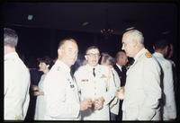Jack Child, President Lanusse, and military personnel chatting at 4th Conference of American Armies