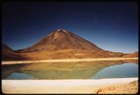 Bolivian salt flats with mountain in background