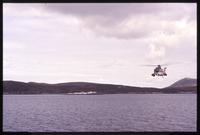 Helicopter flying near Carcass Island