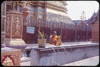 Monk at peak of Doi Suthep  
