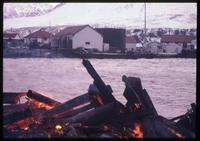Burning wood at Hope Point with Grytviken in background