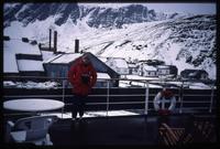 Jack Child on World Discoverer deck with Grytviken in background