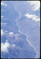 Aerial view of valley between mountain range