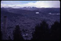 Aerial view of La Paz with mountains in background