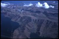 Aerial view of Lake Titicaca and surrounding land from C-130 airplane