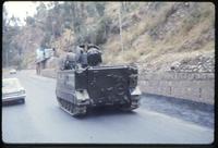 View of armoured personnel carrier tank on road