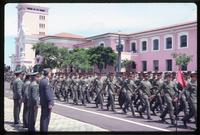 Close view of soldiers marching by Escola Preparat