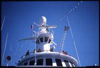 View of tourists on top deck of World Discoverer