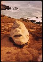 Sculpture of face on beach near Casa de Isla Negra