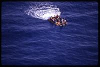 Aerial view of Cuban refugees drifting in a raft, taken as part of a Brothers to the Rescue mission, Miami, Florida
