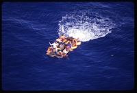 Aerial view of Cuban refugees floating in a raft, taken as part of a Brothers to the Rescue mission, Miami, Florida