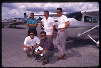 Brothers to the Rescue, a Cuban ex-patriot search and rescue group, personnel posing in front of an airplane, Miami, Florida