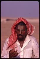 A Sudanese migrant worker sitting during salat, Saudi Arabia