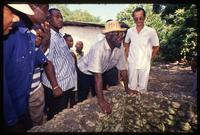 Presidential candidate Marc Bazin on the campaign trail surrounded by his supporters, Haiti