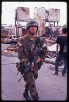 An American soldier patrolling the streets during the United States Invasion of Panama, Panama City, Panama