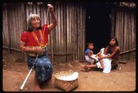 A Kuna woman makes string in the Darien Gap, Panama