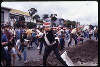 Anti-Sandinista protesters gather and throw rocks outside the gates of the Nicaraguan Embassy in San José, Costa Rica