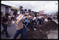 Anti-Sandinista demonstrations throw rocks at the Nicaraguan Embassy in San José, Costa Rica
