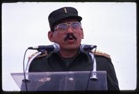 Minister of Defense, General Humberto Ortega, addresses a crowd from a podium, Nicaragua