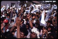 A crowd of Violeta Chamorro supporters cheering during her presidential campaign stop, Nicaragua