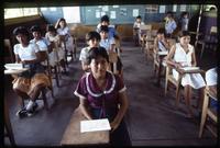 A classroom full of students sitting at their desks at a public school, Nicaragua