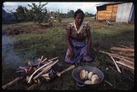 A Miskito woman cooking over an outdoor fire in her village along the Coco River, Nicaragua