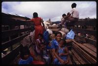 Miskito families in a truck returning to their homeland along the Coco River from the former resettlement camp in the Columbus neighborhood of Tasba Pri, Nicaragua