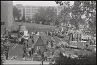 Students and parade floats in the parking lot behind the Mary Graydon Center at American University, October 1968