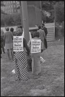 A group of women with signs prepares to march during a Biafra relief rally at the Sylvan Theater, 12 October 1968