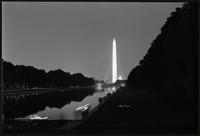 Demonstrators walking along the south side of the Reflecting Pool towards the Lincoln Memorial while participating in a Biafra candlelight vigil, 25 October 1968