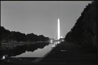 Demonstrators walking around the Reflecting Pool during Biafra candlelight vigil between the Washington Monument and the Lincoln Memorial, 25 October 1968