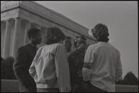 A group of five conversing during a Biafra rally at the base of the Lincoln Memorial, 25 October 1968