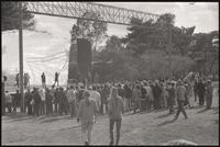 Alternate view of anti-war rally attendees listening to speakers on the Sylvan Theater stage, 26 October 1968