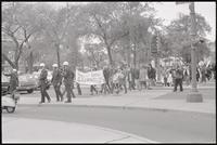 An anti-war march crosses the street at DuPont Circle, 26 October 1968