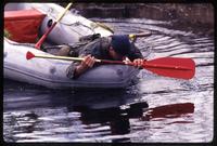 A man paddles a dinghy during an Alpha 66 training exercise, Florida