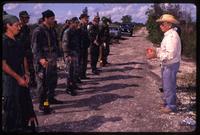 In anti-Castro organizational training, an older man lectures a group of Alpha 66 volunteers, Florida