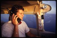 A Brothers to the Rescue pilot flies over the Straits of Florida during a rescue mission, Miami, Florida