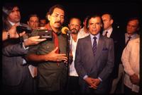 President Daniel Ortega speaking to the press and standing next to President of Argentina Carlos Menem after the Hemispheric Summit Meeting in San José, Costa Rica