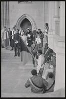 Choir members and others watch as musicians perform outside a memorial service for Martin Luther King, Jr. at the Washington National Cathedral, 29 March 1969