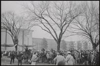 A crowd of demonstrators gives ground to police on the Mall near the Museum of History and Technology, where they gathered to protest an inaugural reception for Spiro Agnew, 19 January 1969