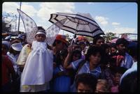 A baby is dressed up as an angel for a Good Friday procession, Managua, Nicaragua