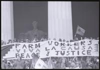 An alternate view of a banner promoting the United Farm Workers of America ("Farm Workers, Viva la Causa, Peace & Justice") directly in front of the Lincoln Memorial during protests against Richard Nixon's second inauguration, 20 January 1973