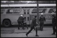 A May Day protester grapples with a riot officer and resists arrest, 01-03 May 1971