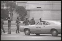 May Day protesters block a car on 7th St NW near the National Gallery, 01-03 May 1971