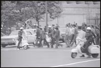 Police observe as protesters gathered near the National Archives during the May Day protests, 03 May 1971