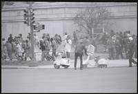 Protesters disperse as police deploy tear gas near the National Archives during the May Day protests, 03 May 1971