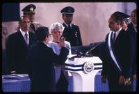 Alfredo Cristiani is sworn in as President, the former President José Napoleón Duarte is in the background, San Salvador, El Salvador
