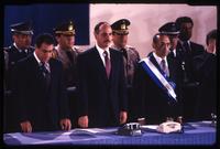 President Alfredo Cristiani, former President José Napoleón Duarte, and Vice President José Francisco Merino López stand at the inauguration ceremony, San Salvador, El Salvador