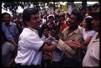 Christian Democratic Party presidential candidate Fidel Chávez Mena shakes hands at a campaign rally, El Salvador