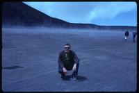 Jack Child at Irazú crater with fog and mountain in background